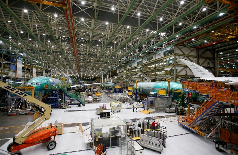 FILE PHOTO: Several Boeing 777X aircraft are seen in various stages of production during a media tour of the Boeing 777X at the Boeing production facility in Everett, Washington, U.S., February 27, 2019. Picture taken February 27, 2019. REUTERS
