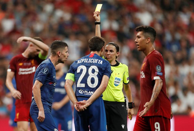 UEFA Super Cup - Liverpool v Chelsea - Vodafone Arena, Istanbul, Turkey - August 14, 2019 Chelsea`s Cesar Azpilicueta is shown a yellow card by referee Stephanie Frappart Action Images via Reuters