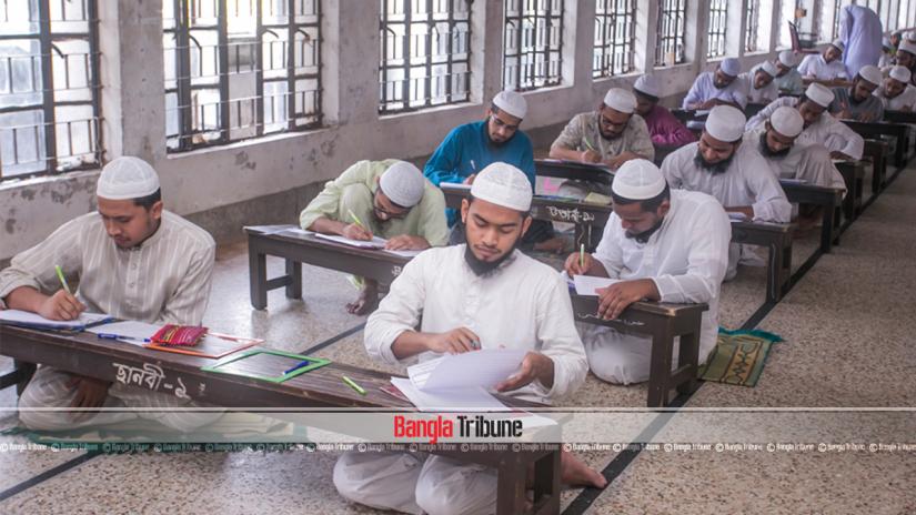 This undated photo shows students taking a test at a qawmi madrasa in Dhaka. SAZZAD HOSSAIN/File Photo