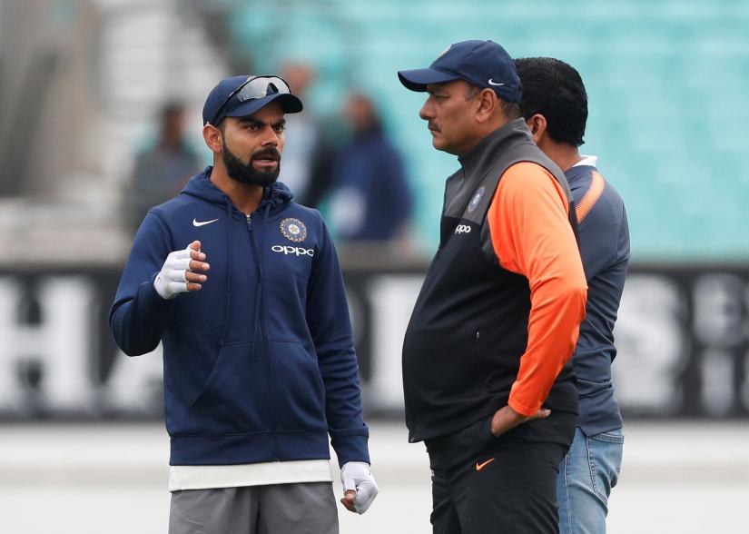 Cricket - India Nets - Kia Oval, London, Britain - September 5, 2018 India`s Virat Kohli talks to head coach Ravi Shastri during nets Action Images via Reuters/File Photo