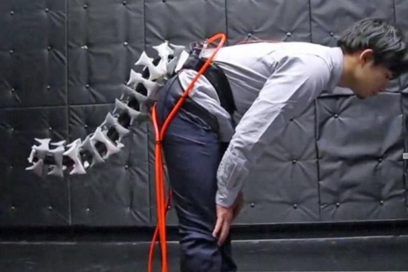 Dubbed Arque, the grey one-meter device mimics tails such as those of cheetahs and other animals used to keep their balance while running and climbing, according to the Keio team. Reuters