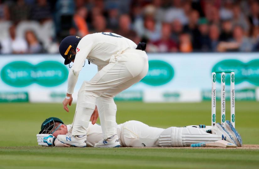 Cricket - Ashes 2019 - Second Test - England v Australia - Lord`s Cricket Ground, London, Britain - August 17, 2019 Australia`s Steve Smith down injured after being hit on the neck with a ball bowled by England`s Jofra Archer Action Images via Reuters