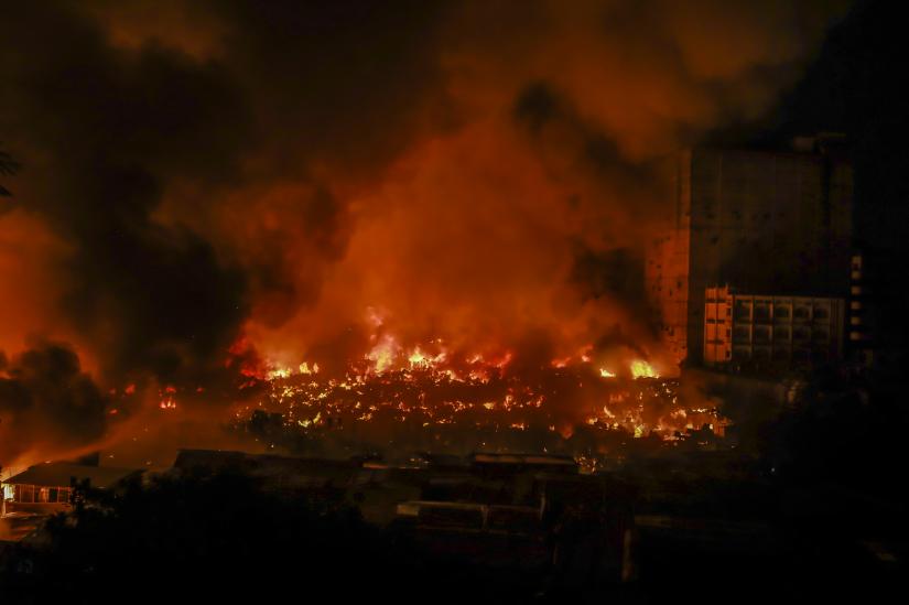 A devastating fire guts over 1,000 shanties at Chalantika slum of Mirpur`s Section-7 on Friday (Aug 16) evening. PHOTO/Sazzad Hossain