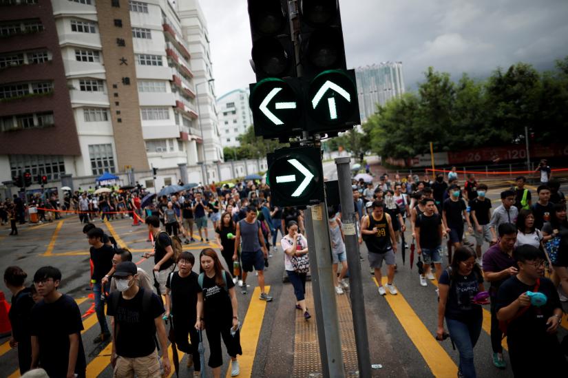 People take part in the `Reclaim Hung Hom and To Kwa Wan, Restore Tranquility to Our Homeland` demonstration against the extradition bill in To Kwa Wan neighborhood, Hong Kong, China August 17, 2019. REUTERS