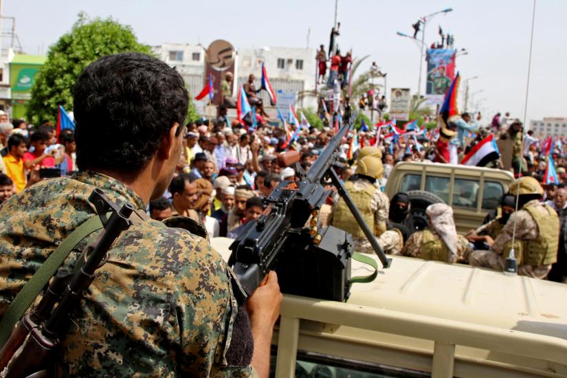 FILE PHOTO: Members of UAE-backed southern Yemeni separatists forces are seen together with their supporters as they march during a rally in southern port city in Aden, Yemen August 15, 2019. REUTERS/File Photo