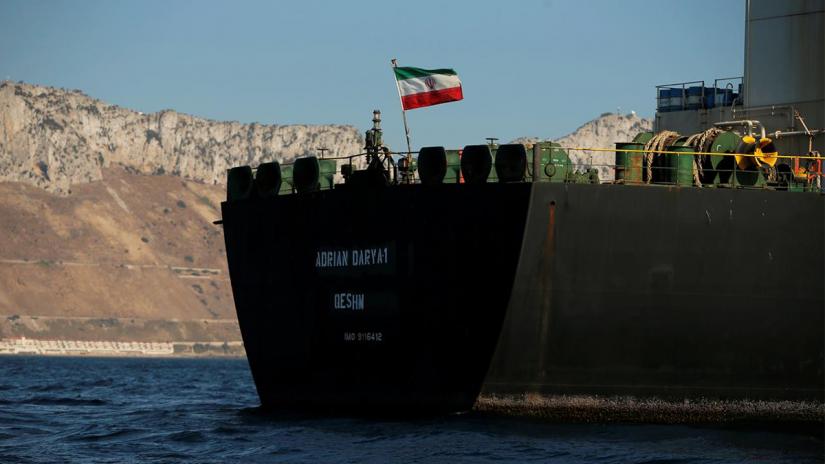 The Iranian flag flies on board the Iranian oil tanker Adrian Darya 1, formerly named Grace 1, as it sits anchored after the Supreme Court of the British territory lifted its detention order, in the Strait of Gibraltar, Spain, August 18, 2019. REUTERS