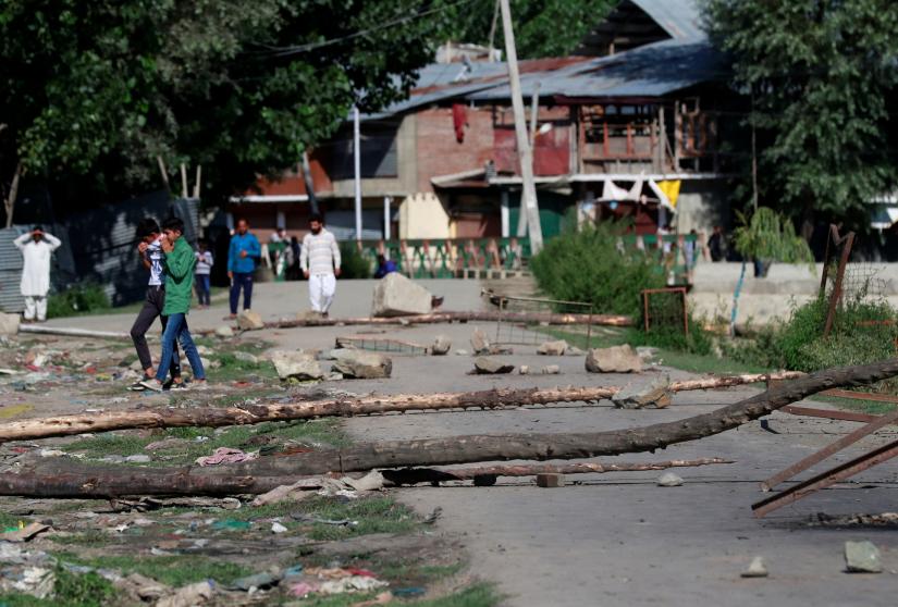 A neighbourhood street is blocked with tree branches by Kashmiri protesters during restrictions after the scrapping of the special constitutional status for Kashmir by the government, in Srinagar, August 19, 2019. REUTERS