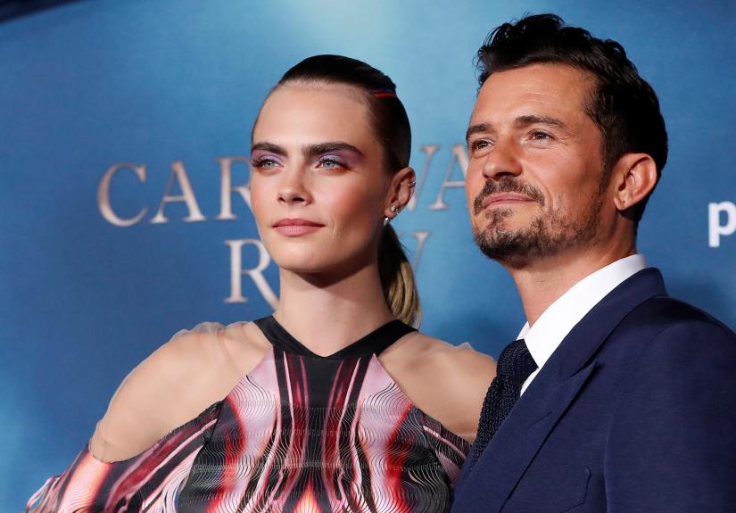 Cast members Orlando Bloom and Cara Delevinge attend the premiere for the television series `Carnival Row` in Los Angeles, California, U.S., August 21, 2019. REUTERS