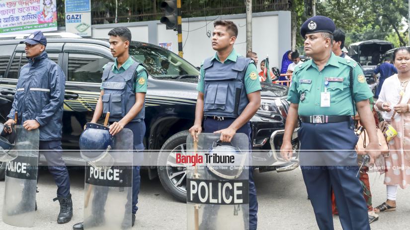 Police stand guard during Janmashtami celebration