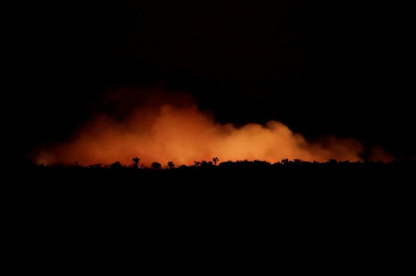 Smoke billows during a fire in an area of the Amazon rainforest near Humaita, Amazonas State, Brazil, Brazil Aug 17, 2019. REUTERS/FILE PHOTO