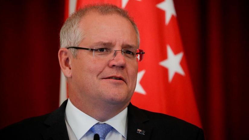 FILE PHOTO: Australian Prime Minister Scott Morrison speaks during a joint press conference at the Istana Presidential Palace in Singapore, 07 June 2019. REUTERS