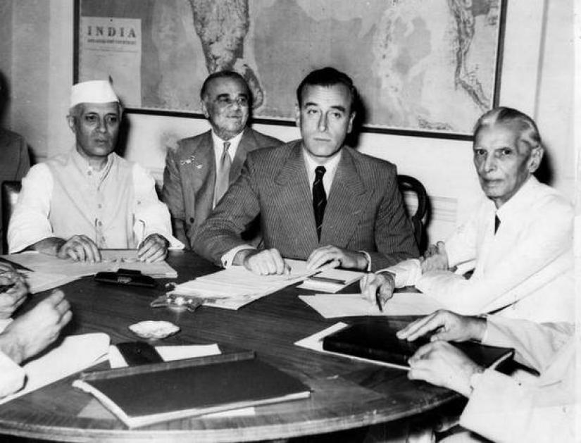 From left seated at the table, Jawarharlal Nehru, vice president of India’s interim government; Earl Mountbatten, viceroy of India; and Muhammad Ali Jinnah, president of the Muslim League discuss Britain’s plan for India, June 2, 1947. Photo: Max Desfor