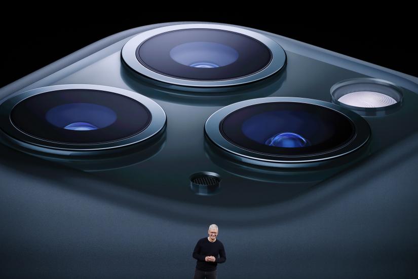 CEO Tim Cook presents the new iPhone 11 Pro at an Apple event at their headquarters in Cupertino, California, U.S. September 10, 2019. REUTERS