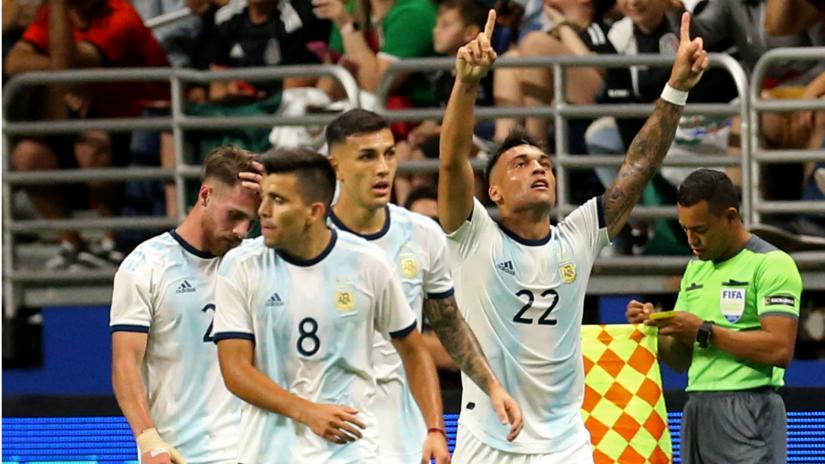 Lautaro Martinez celebrates after goal against Mexico.