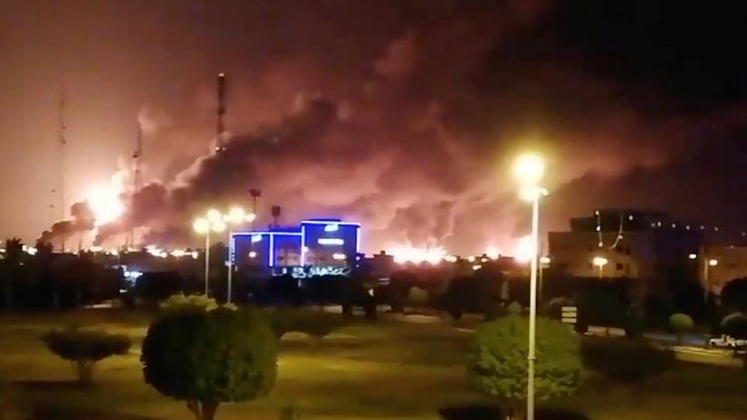 Smoke is seen following a fire at an Aramco factory in Abqaiq, Saudi Arabia, September 14, 2019 in this picture obtained from social media. Reuters
