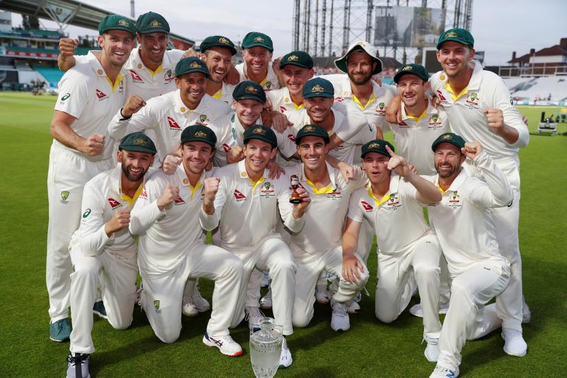 Cricket - Ashes 2019 - Fifth Test - England v Australia - Kia Oval, London, Britain - September 15, 2019 Australia players celebrate with the Ashes trophy and urn after drawing the series to retain the Ashes Action Images via Reuters