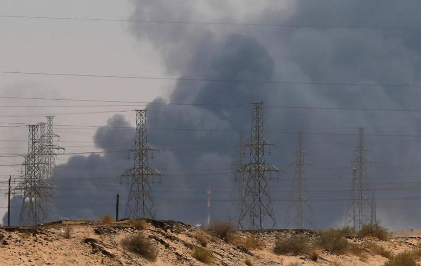 Smoke is seen following a fire at an Aramco factory in Abqaiq, Saudi Arabia, September 14, 2019. REUTERS