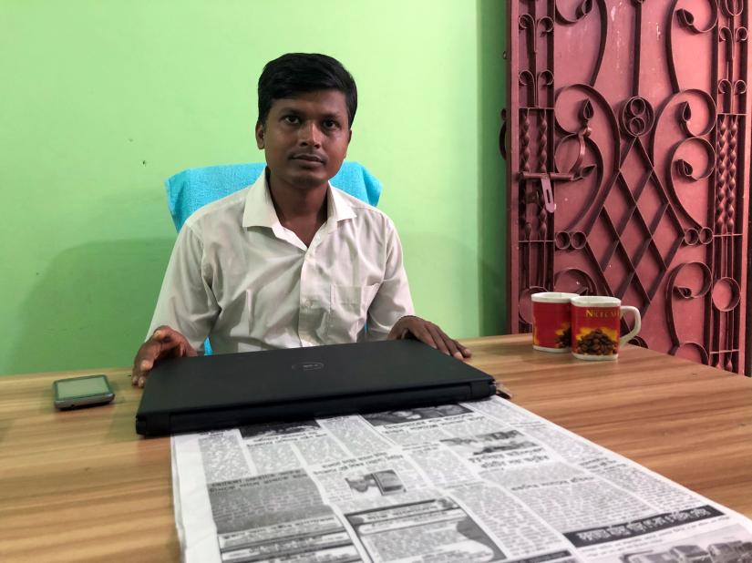 Bangladeshi journalist Sharif Azad is pictured inside his office in Ukhia Upazila, Bangladesh August 27, 2019. REUTERS