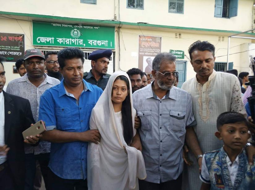 Family members with slain Rifat Sharif`s wife Ayesha Siddiqua Minni at the Barguna District Jail gate on Tuesday, September 3, 2019