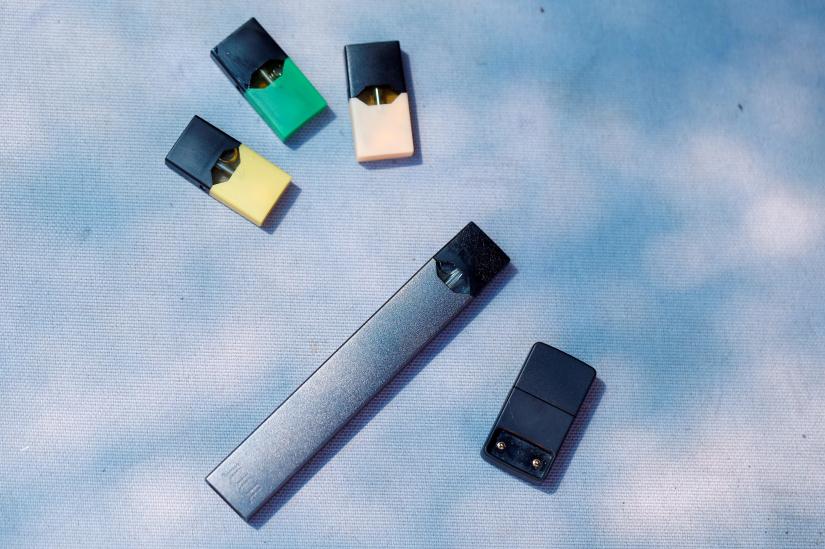 A Juul e-cigarette and pods are seen in this picture illustration taken September 16, 2018. REUTERS/File Photo