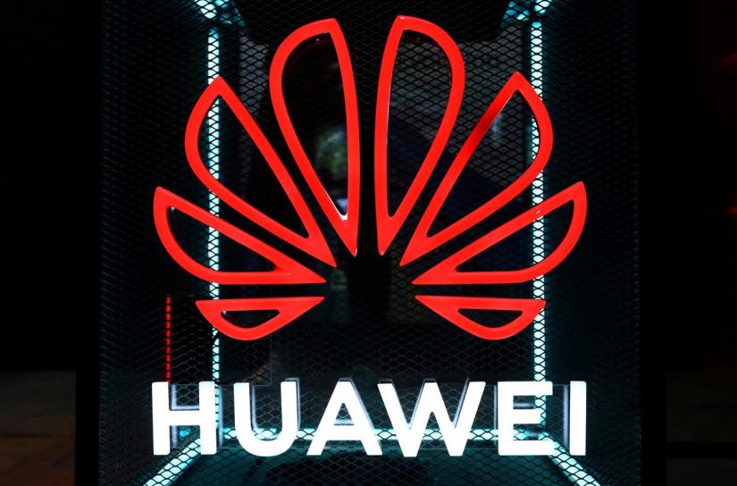FILE PHOTO: The Huawei logo is pictured at the IFA consumer tech fair in Berlin, Germany, September 5, 2019. REUTERS/Hannibal Hanschke/File Photo
