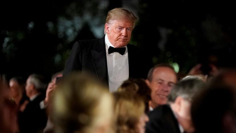 US President Donald Trump greats guests during a state dinner for Australia’s Prime Minister Scott Morrison in the Rose Garden of the White House in Washington, US, Sept 20, 2019. REUTERS