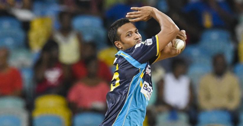 FILE PHOTO-Barbados Tridents` Bangladesh all-rounder Shakib al Hasan bowls during their CPL match against St Kitts and Nevis Patriots in Bridgetown on Saturday (Sept 29). CPL T20