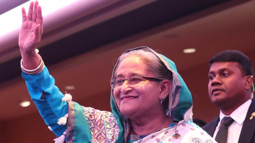 FILE PHOTO-Prime Minister Sheikh Hasina addresses a civic reception at Hotel Marriot Marquis in New York organised by the USA chapter of Awami League on Saturday (Sept 28). PID