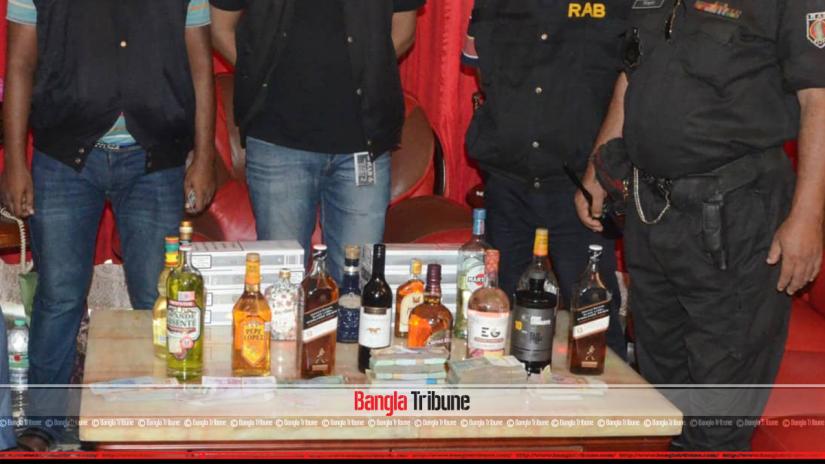 RAB said that they seized 84 bottles of liquor, over Tk 2.9 million in cash and foreign currencies worth over Tk 7.7 million during the raids at Salim Pradhan`s office and home.