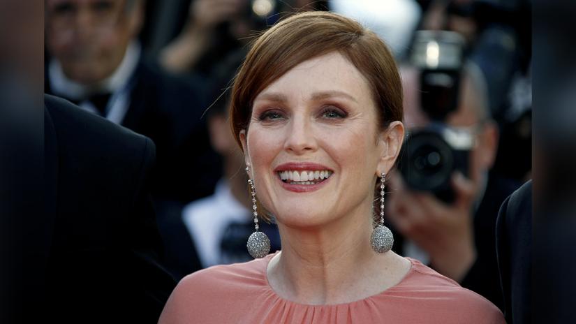 FILE PHOTO: 72nd Cannes Film Festival - Red Carpet Arrivals - Cannes, France, May 16, 2019. Julianne Moore poses ahead of screening of the `5B` movie. REUTERS