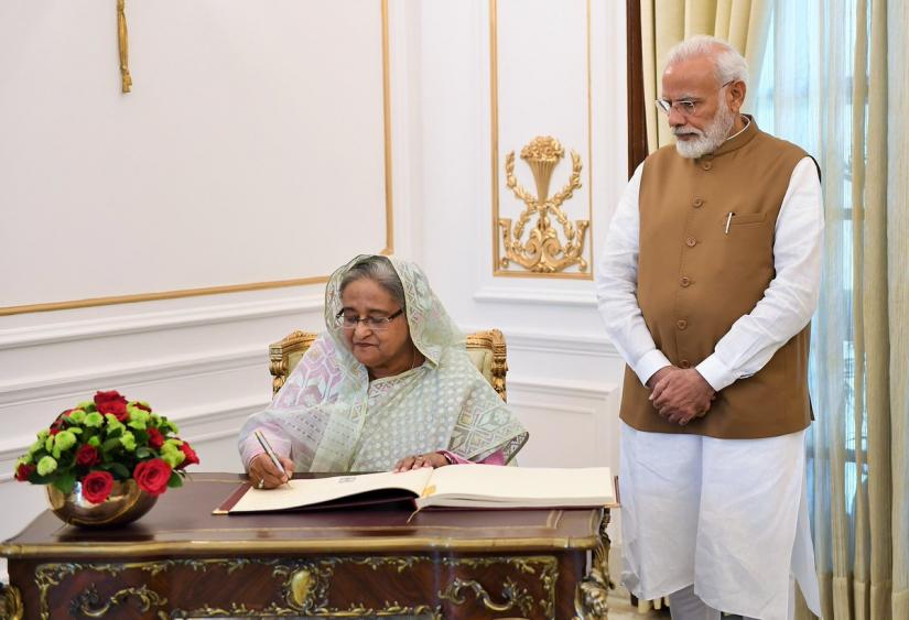 Prime Minster Sheikh Hasina and her Indian counterpart Narendra Modi are seen during a document signing ceremony in New Delhi on Saturday (Oct 5).