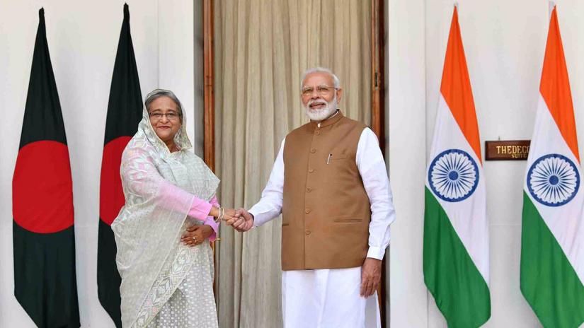 Prime Minister Sheikh Hasina is received by her Indian counterpart Narendra Modi in New Delhi on Saturday (Oct 5). TWITTER/@MEAIndia