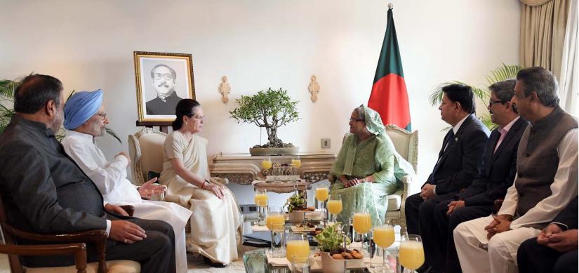 Indian National Congress President Sonia Gandhi pays a courtesy call on Prime Minister Sheikh Hasina at Hotel Taj Mahal in New Delhi on Sunday (Oct 6). PID