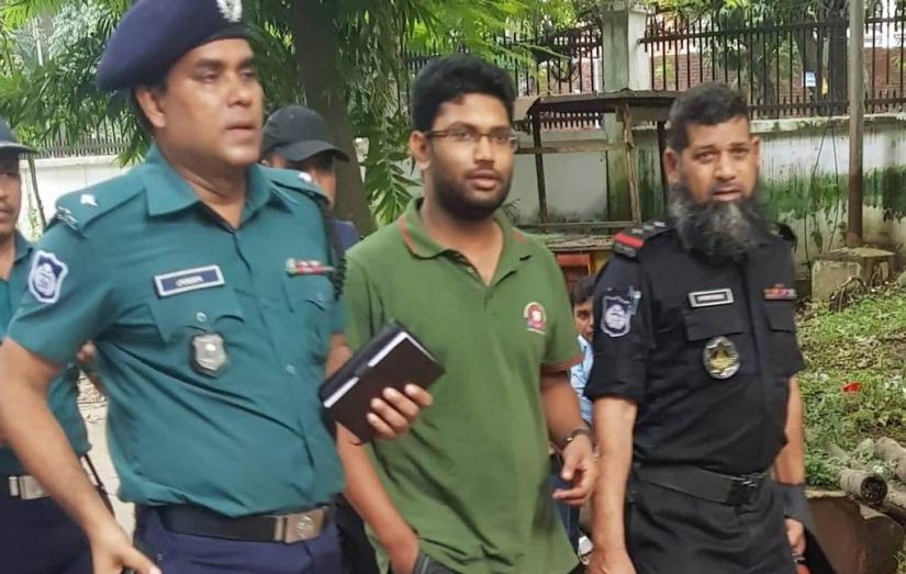 Police escort Buet Chhatra League Joint Secretary Muttakim Fuad at Buet Campus in Dhaka on Monday, October 7, 2019 Collected