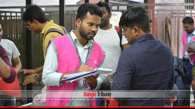 A returnee registering his name at Hazrat Shahjalal International Airport after being deported from Saudi Arabia.
