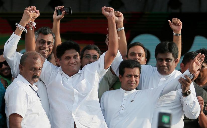 Sajith Premadasa, Sri Lanka`s Housing Minister and the presidential candidate of the United National Party (UNP)-led New Democratic Front, waves to his supporters as he arrives at his first election campaign rally, in Colombo, Sri Lanka Oct 10, 2019. REUTERS