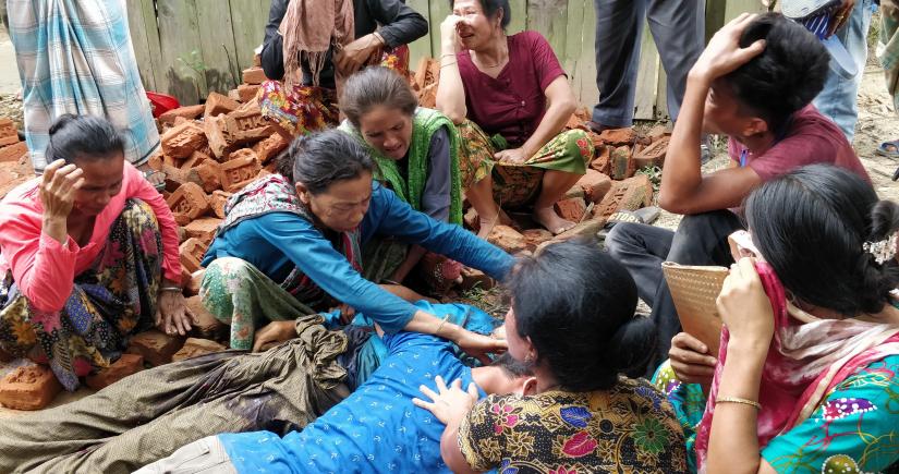 Relatives are seen wailing after a man was killed in a firing by Border Guard Bangladesh troops at a polling centre in Bandarban’s Naikhongchhari on Monday (Oct 14).