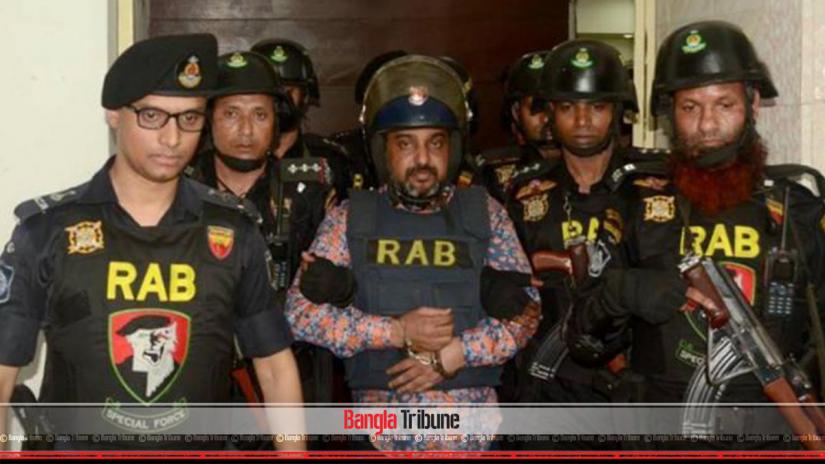 RAB escort Ismail Chowdhury Samrat at his office in Kakrail, Dhaka on Oct 6, 2019. FILE PHOTO