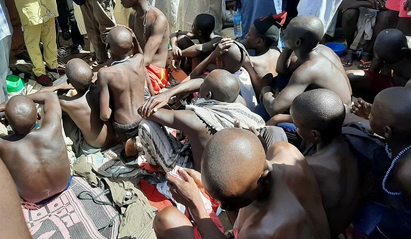 FILE PHOTO: Men and boys are pictured after being rescued by police in Sabon Garin, in Daura local government area of Katsina state, Nigeria Oct 14, 2019. REUTERS