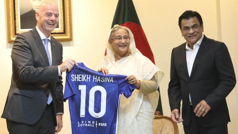 FIFA President Gianni Infantino hands over a FIFA jersey to Prime Minister Sheikh Hasina with her name on it, Oct 17, 2019, Dhaka Bangladesh. FOCUS BANGLA