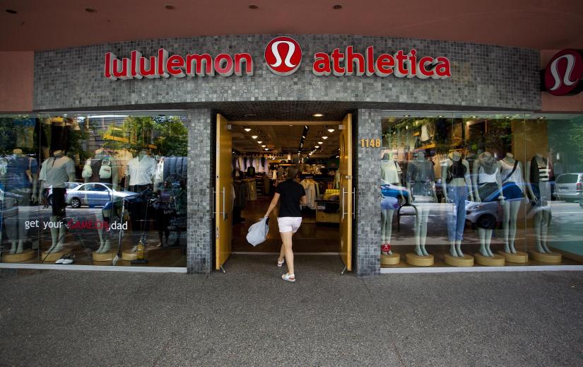 A woman walks into a store of yogawear retailer Lululemon Athletica in downtown Vancouver June 11, 2014. Reuters