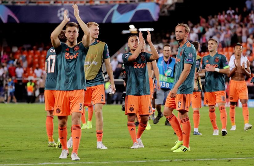 Soccer Football - Champions League - Group H - Valencia v Ajax Amsterdam - Mestalla, Valencia, Spain - October 2, 2019 Ajax`s Joel Veltman with team mates applaud fans after the match REUTERS/FILE PHOTO