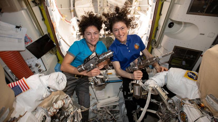 US astronauts Christina Koch and Jessica Meir stepped outside in their NASA spacesuits at 11:38 GMT (07:38 EDT). SCIENCE PHOTO LIBRARY