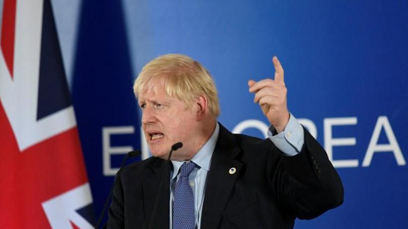 FILE PHOTO: Britain`s Prime Minister Boris Johnson speaks during a news conference at the European Union leaders summit dominated by Brexit, in Brussels, Belgium Oct 17, 2019. REUTERS