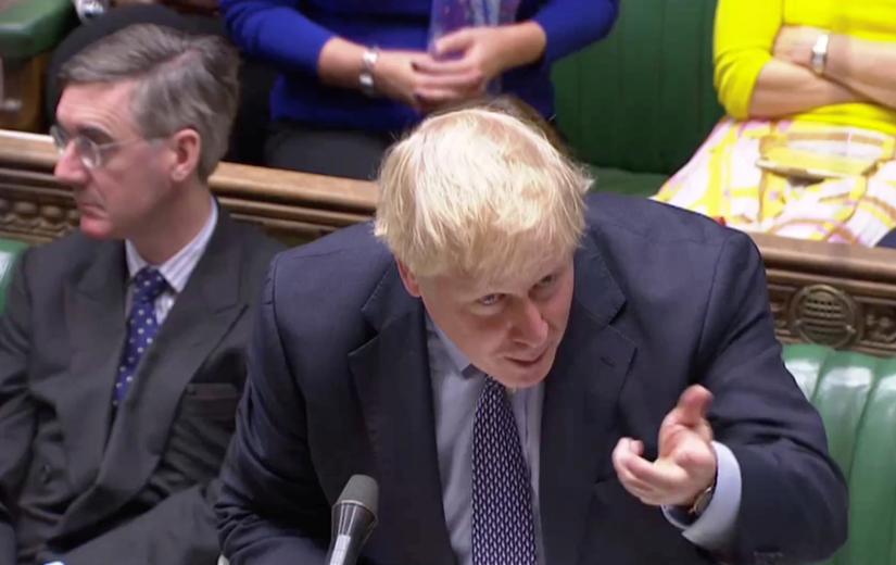 Britain`s Prime Minister Boris Johnson speaks at the House of Commons as parliament discusses Brexit, sitting on a Saturday for the first time since the 1982 Falklands War, in London, Britain, October 19, 2019, in this screen grab taken from video. Parliament TV via REUTERS
