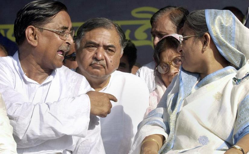 Dr Kamal Hossain, centre, is seen with Bangladeshi PM and Awami League leader Sheikh Hasina, right, and Rashed Khan Menon, left, leader of the Workers Party, during a political rally in Dhaka in 2006. Photo: LOOKEAST