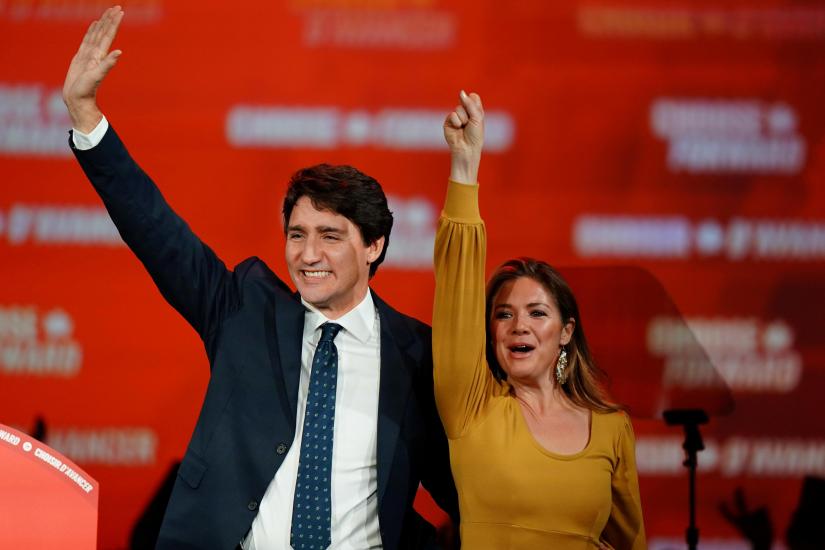 Liberal leader and Canadian Prime Minister Justin Trudeau and his wife Sophie Gregoire Trudeau react after the federal election at the Palais des Congres in Montreal, Quebec, Canada October 22, 2019. REUTERS