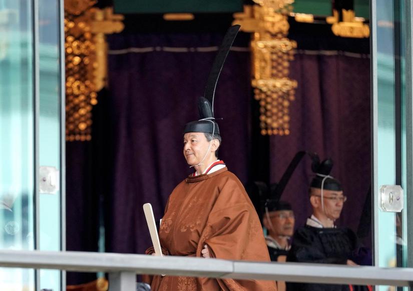 Japanese Emperor Naruhito leaves the ceremony hall after proclaiming his enthronement at the Imperial Palace in Tokyo, Japan, October 22, 2019. REUTERS