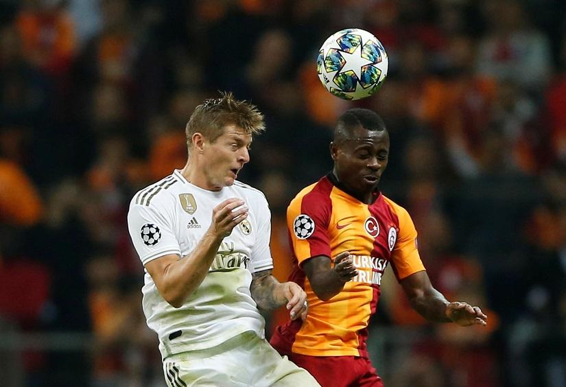 Soccer Football - Champions League - Group A - Galatasaray v Real Madrid - Turk Telekom Stadium, Istanbul, Turkey - October 22, 2019 Real Madrid`s Toni Kroos in action with Galatasaray`s Jean Michael Seri REUTERS