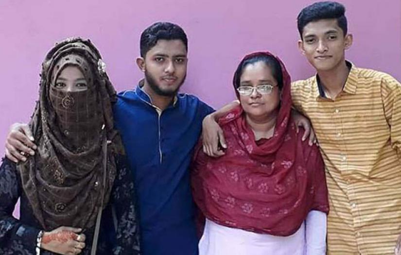 File photo shows  Nusrat (r) with her family